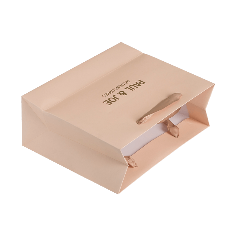 Sacos de presente de marca de luxo personalizados Saco de papel para presente de casamento Saco de compras para roupas